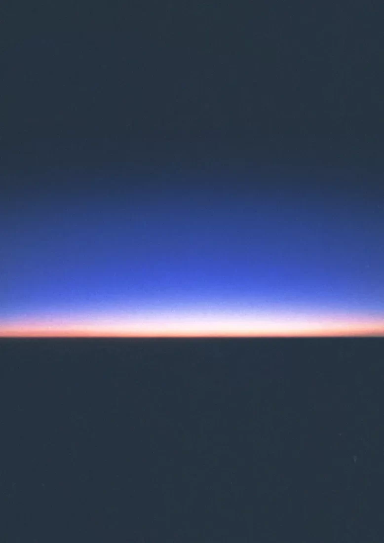 blue texture that emulates the sunrise. made about a picture of the sunrise taken by an airplane window.