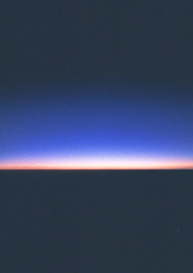 blue texture that emulates the sunrise. made about a picture of the sunrise taken by an airplane window.