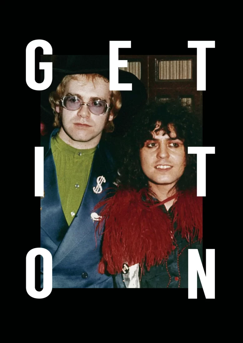 Cartaz preto com foto de Elton John e Marc Bolan tirada em dezembro de 1973 no meio. Escrito: Get it On. a.
