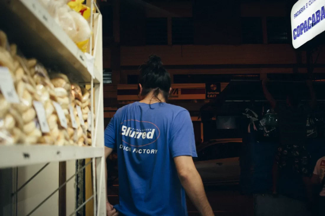 back angle of a man at the door of copacabana bakery