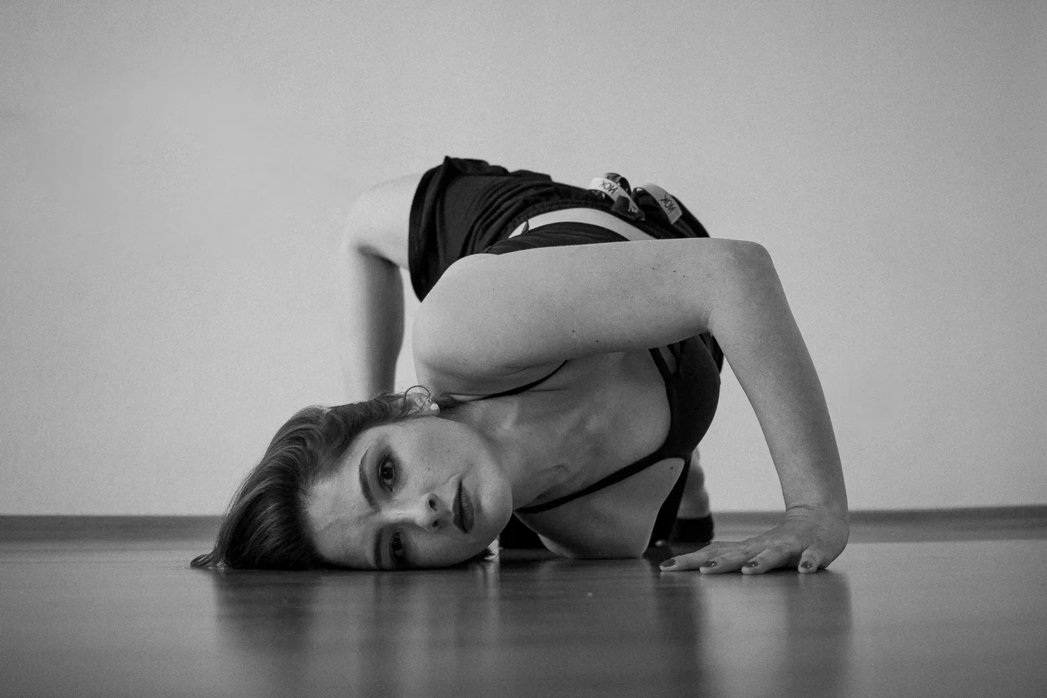 A woman in dance poses. Shot on balck and white
