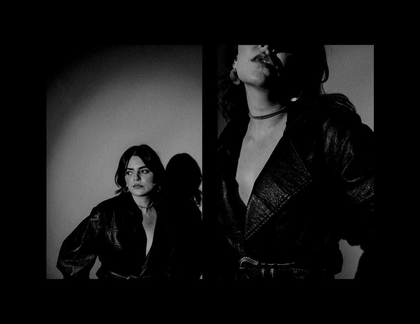black and white photo of a woman cropped showing only her mouth and chest. she is wearing a leather jacket