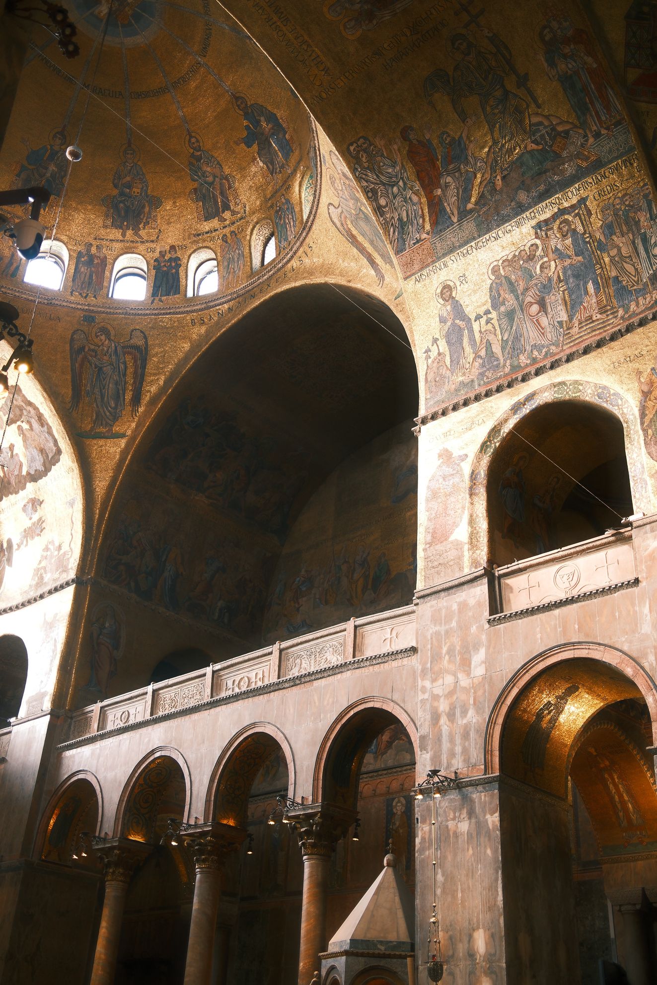 Golden Mosaics of St. Mark’s Basilica in Venice – Photography by Rodrigo Baumgratz This evocative photograph by Rodrigo Baumgratz captures the glowing golden mosaics and Byzantine arches of St. Mark’s Basilica in Venice. The intricate frescoes and gilded domes rise with sacred intensity, showcasing a balance of grandeur and intimacy within one of the world’s most iconic cathedrals. The warm tones, layered textures, and dramatic lighting highlight both architectural mastery and spiritual symbolism. Perfect for portfolios in artistic architectural photography, sacred spaces, Venetian heritage, and fine art documentation of historic landmarks.