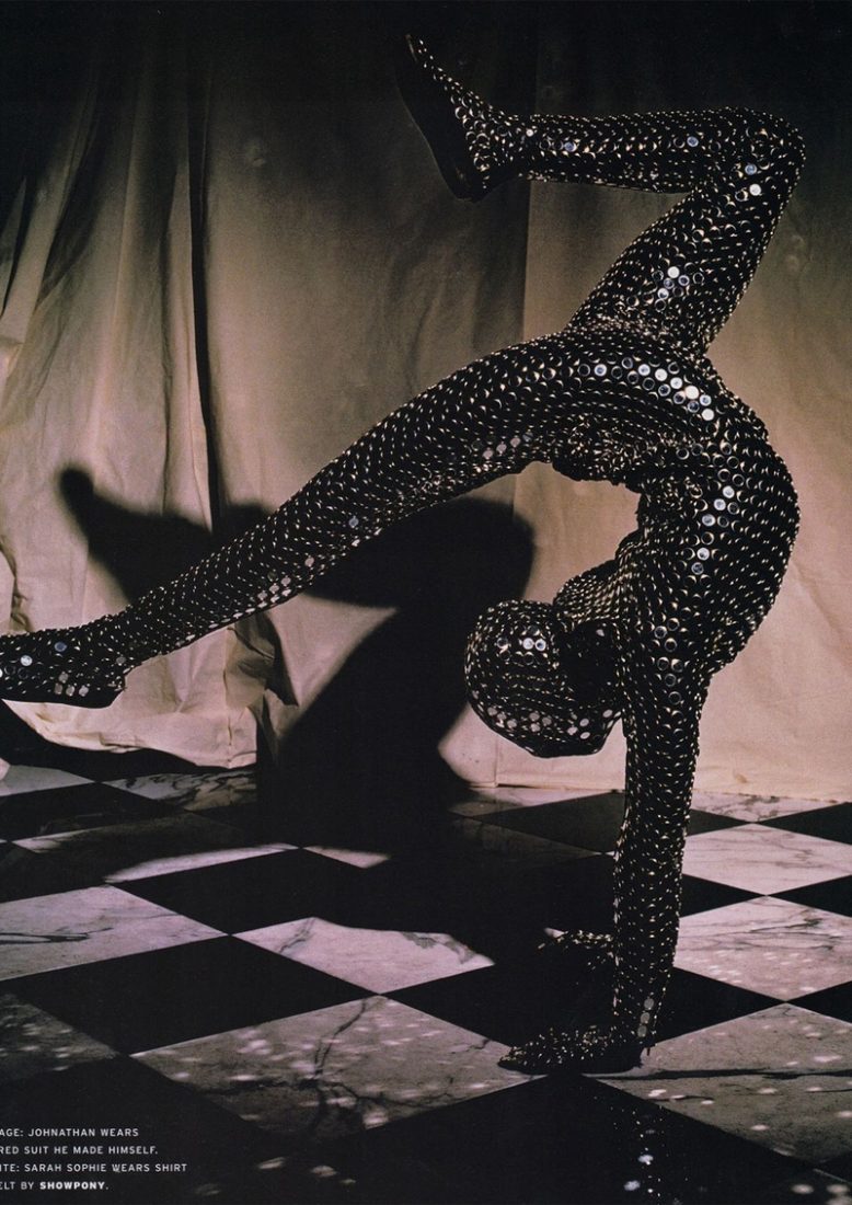 Get It On Poster – Futuristic Body Design for Maquinaria by Rodrigo Baumgratz This bold club poster by Rodrigo Baumgratz captures the raw energy of nightlife through a striking image of a body encased in a metallic, studded suit. Bent in an extreme pose against a backdrop of dramatic shadows, the figure evokes both machine and sculpture, blending fashion, performance, and surrealism. The bold typography “GET IT ON” cuts across the composition in stark white, amplifying the direct and visceral call to dance. Perfect for portfolios exploring experimental graphic design, club culture aesthetics, and radical visual communication.