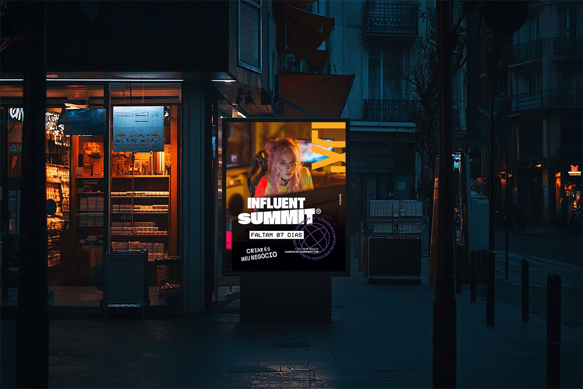 Animated digital OOH poster designed by creative director Rodrigo Baumgratz for the Influents Summit, displayed on a street-side urban media panel at night. The piece features a vibrant, neon-lit portrait of a creator with pink hair inside a warm-toned studio, combined with bold typography announcing the event countdown. The layout integrates graphic elements, brand symbols, and motion design to communicate innovation, creator economy culture, and contemporary visual identity